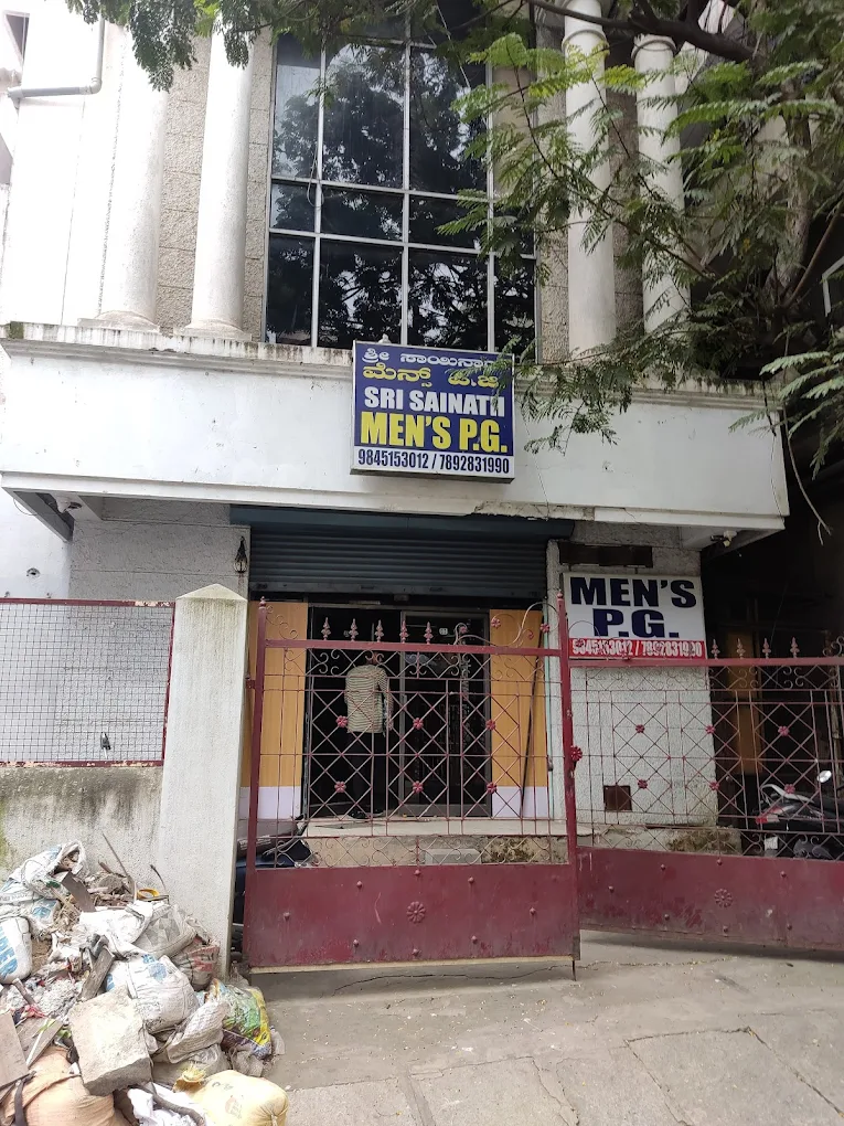 Sri Sainath Mens PG & logo